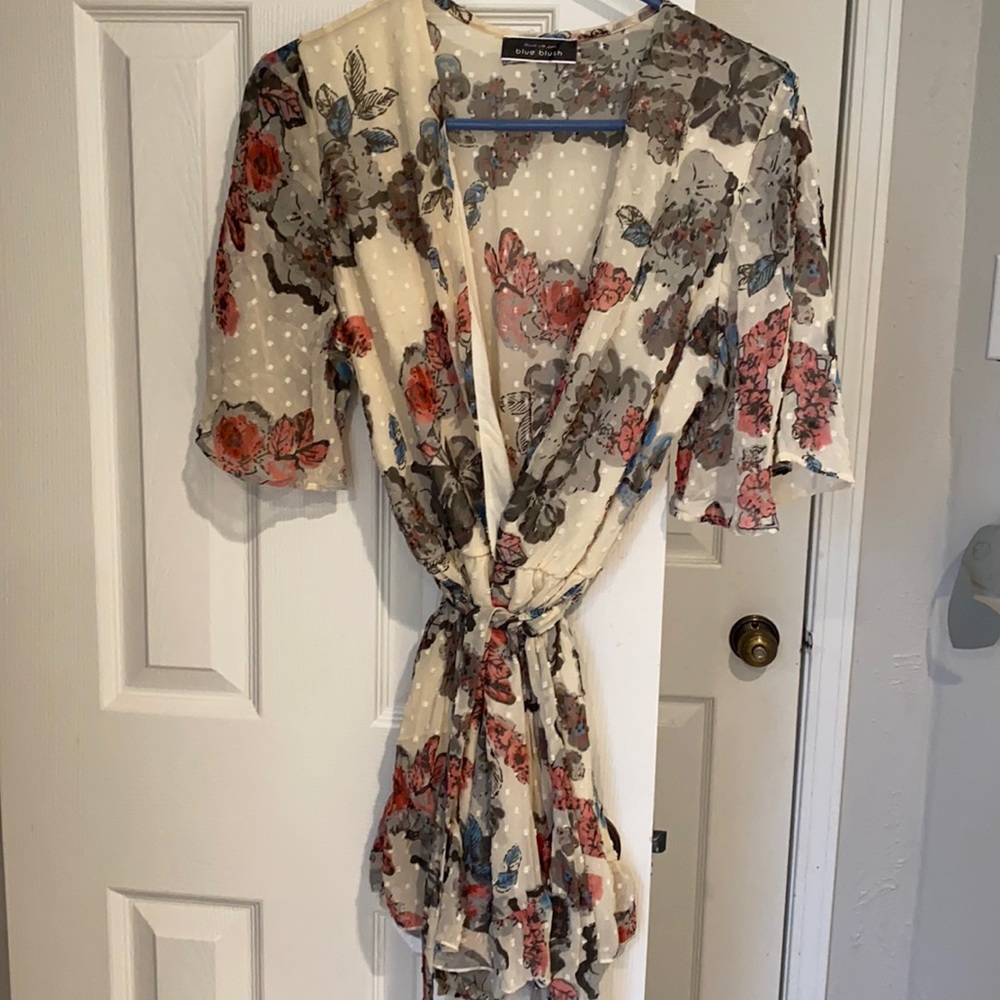 Floral romper. Never worn.